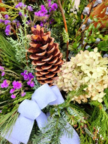 Brookfield Wisconsin Outdoor Winter Planter with Natural Elements of Dried Statice, Dried Hydrangea, Eucalyptus Pods, Pinecones and Winter Greens