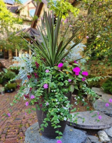 Custom summer planter designed and planted for a home in Pewaukee, WI